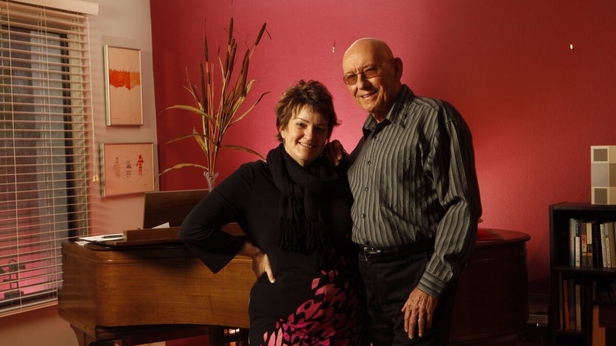 Holly Hofmann, is a reknown jazz flutist standing with her husband, leading jazz pianist Mike Wofford.