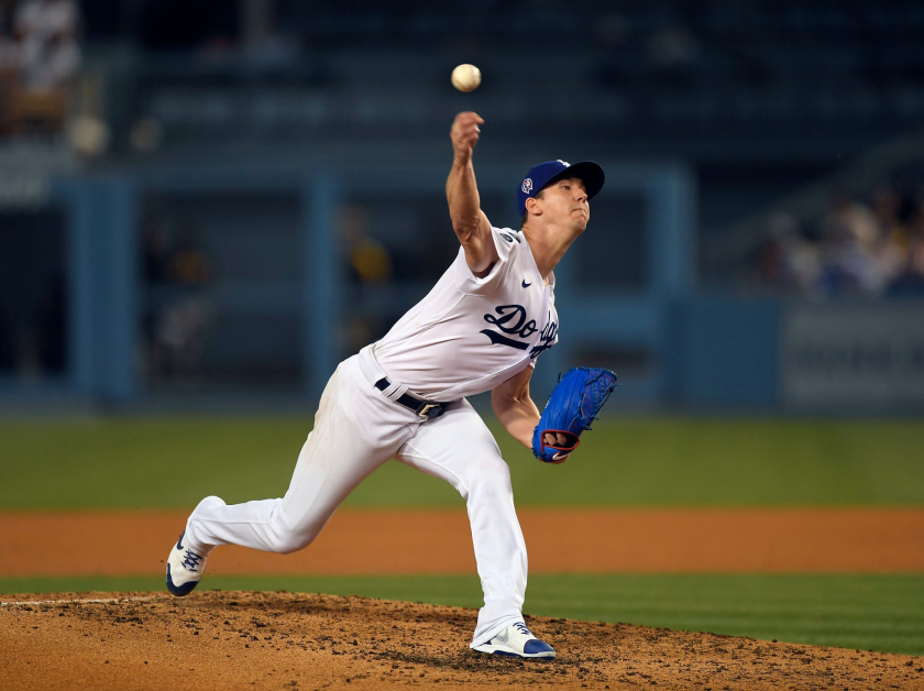 Dodgers starter Walker Buehler delivers during the fourth inning against the Padres on Saturday.