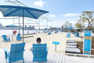 The first manmade beach on Gansevoort Peninsula opened on the Hudson River, New York City. It is located across from the Whitney Museum and near Little Island and has views of the Freedom Tower and the Statue of Liberty. . (Photo by: Deb Cohn-Orbach/UCG/Universal Images Group via Getty Images)