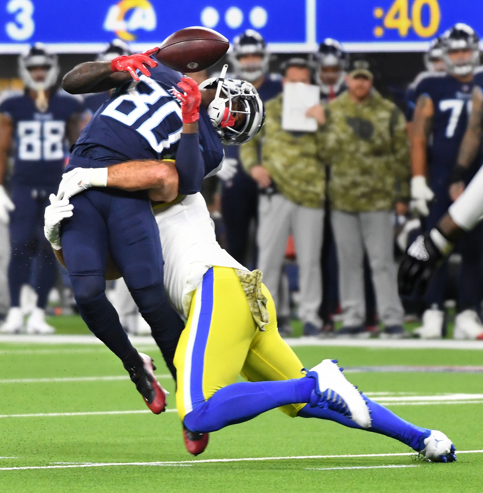 Titans receiver Chester Rogers can't make a catch as he takes big hit from Rams linebacker Ernest Jones.