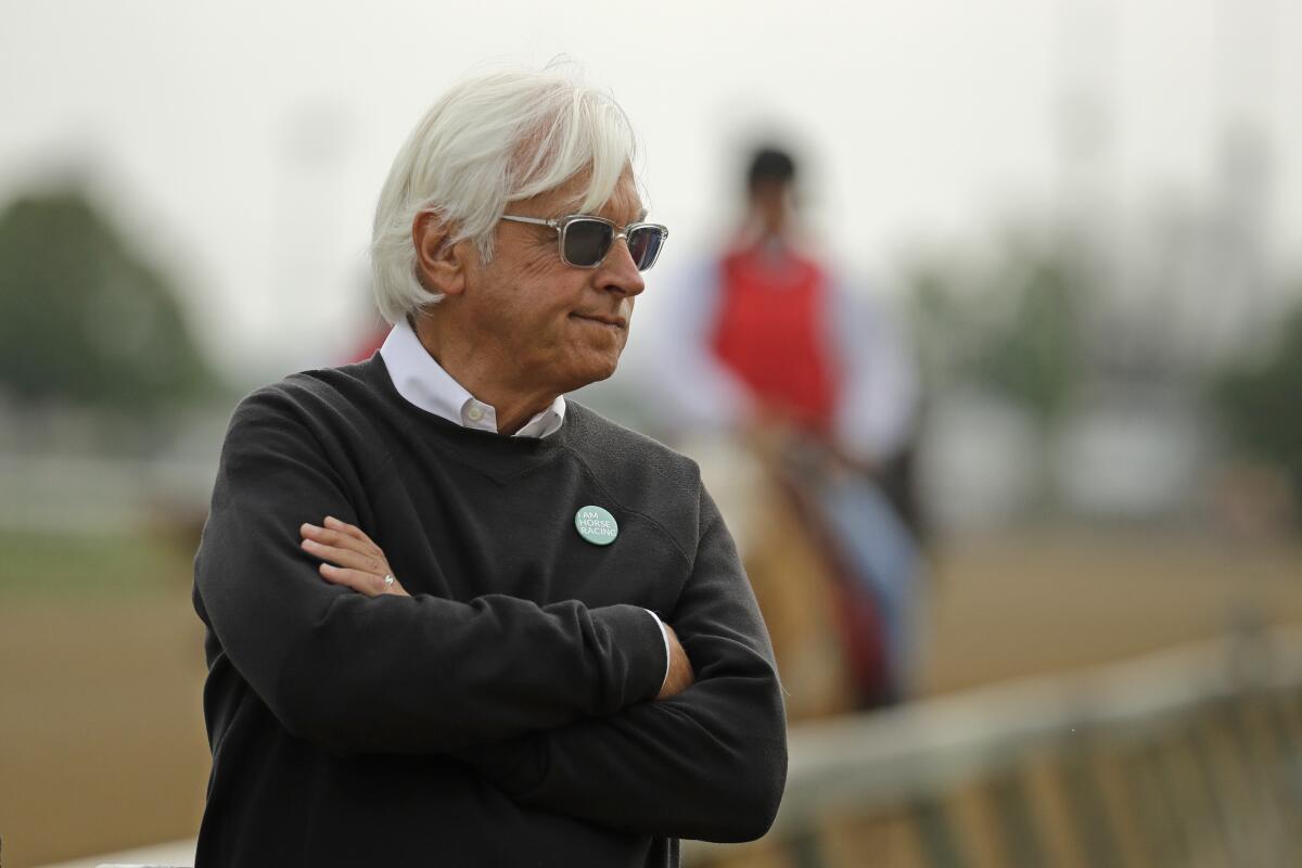 In this May 1, 2019, file photo, trainer Bob Baffert watches his Kentucky Derby entrant Game Winner.