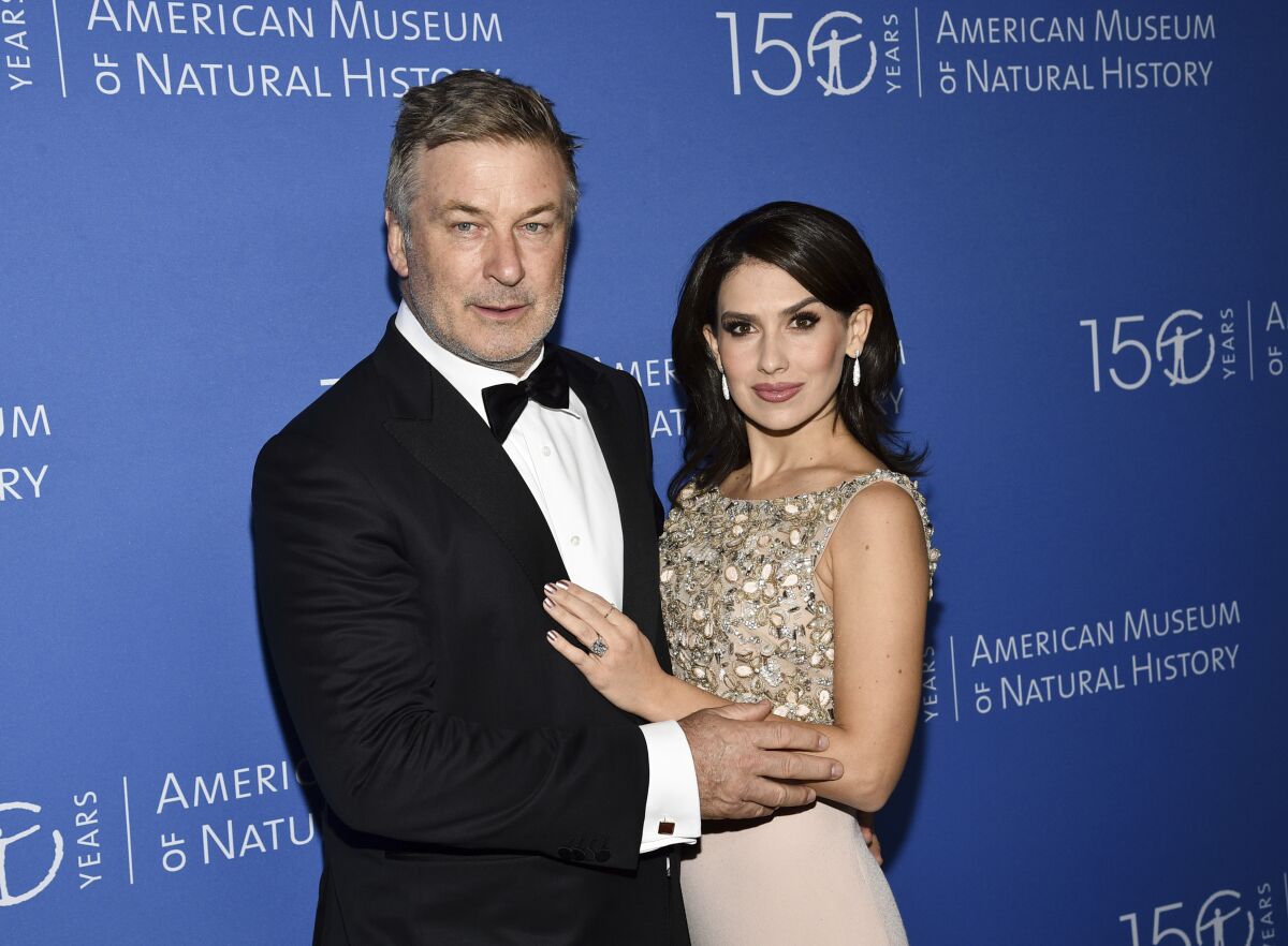 FILE - Alec Baldwin, left, and wife Hilaria Baldwin attend the American Museum of Natural History's Museum Gala on Nov. 21, 2019, in New York. The couple on Wednesday, Sept. 9, 2020, announced the arrival of a baby boy, their fifth child together. Hilaria Baldwin posted on Instagram and said the boy “is perfect and we couldn't be happier. Stay tuned for a name.” (Photo by Evan Agostini/Invision/AP, File)