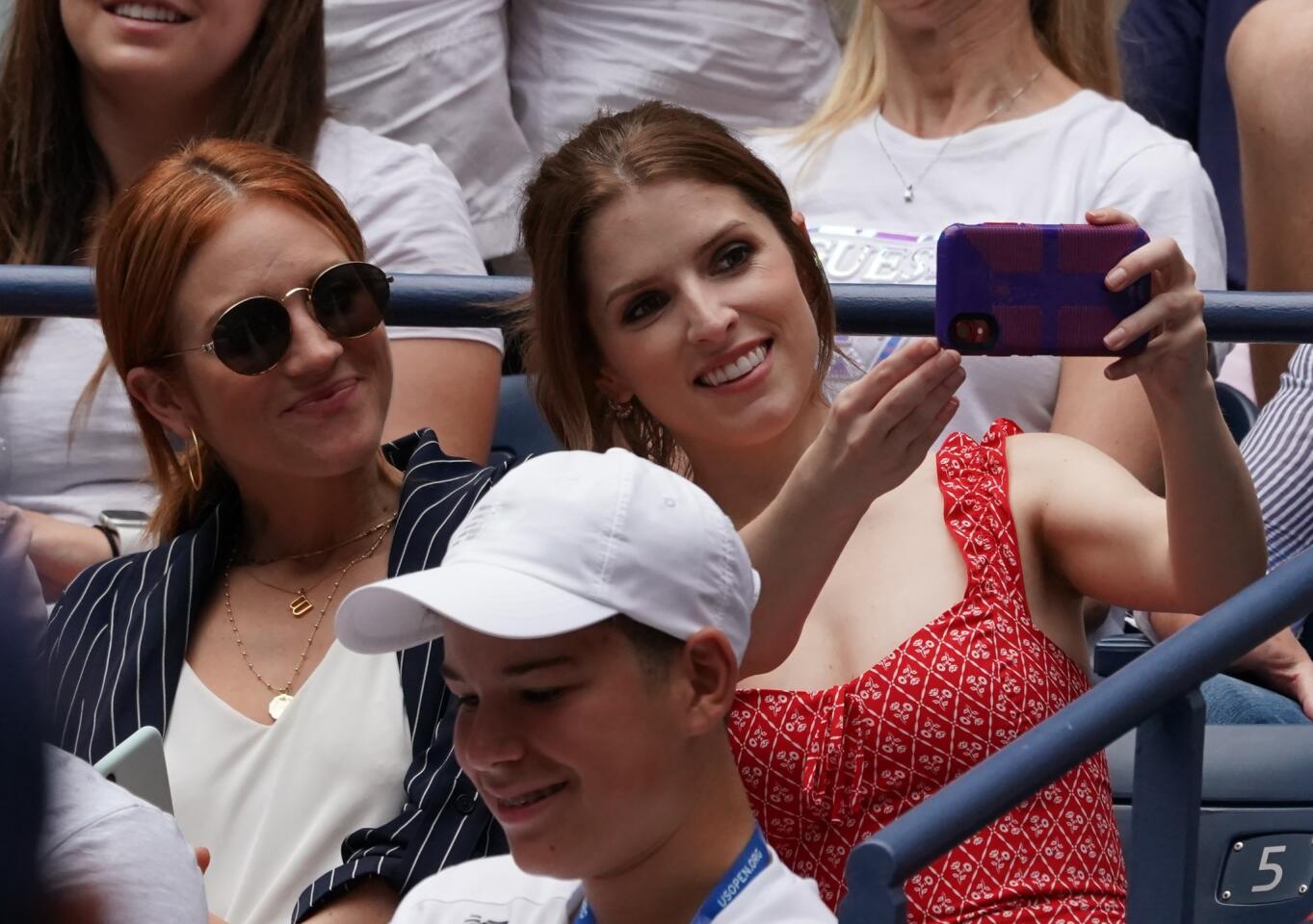 "Pitch Perfect" co-stars Brittany Snow and Anna Kendrick takes a selfie as they watch Serena Williams of the U.S. against Petra Martic of Croatia during their Round Four Women's Singles match at the 2019 U.S. Open at the USTA Billie Jean King National Tennis Center in New York on Sept. 1, 2019.