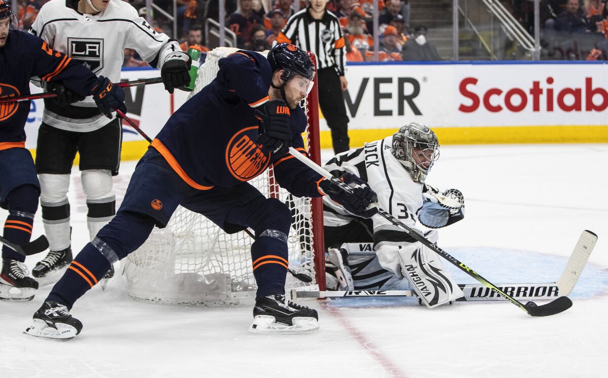 Kings goalie Jonathan Quick makes a save against Edmonton Oilers' Leon Draisaitl.