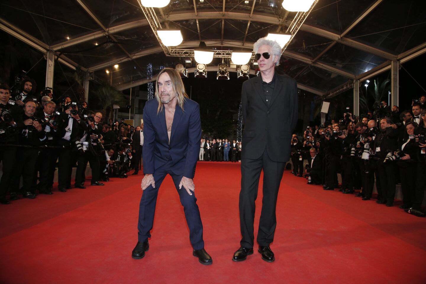 Singer Iggy Pop, left, and director Jim Jarmusch arrive at the screening of "Gimme Danger."