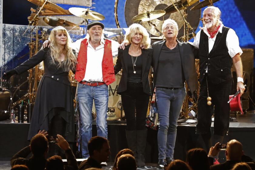 Fleetwood Mac take their bows at the 2018 MusiCares tribute honoring the band in January.