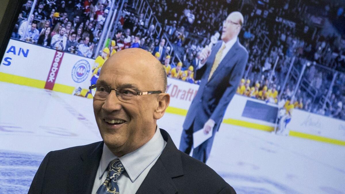 Los Angeles Kings announcer Bob Miller arrives to announce his retirement due to health concerns during a news conference at Staples Center on March 2.