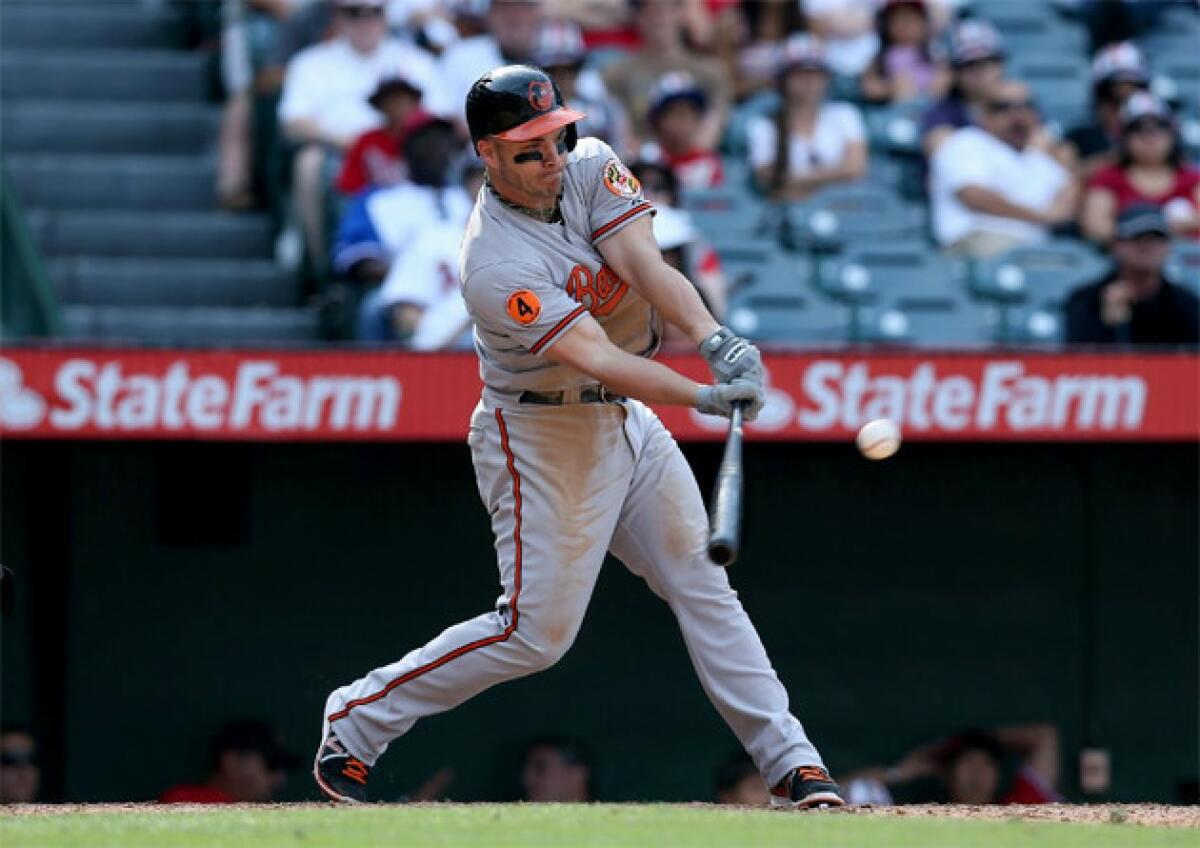 Baltimore Orioles' Steve Pearce drives in the go-ahead run in the 10th inning.