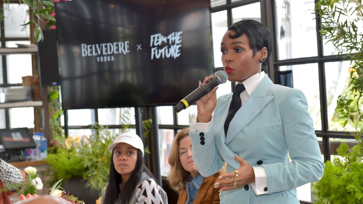 Janelle Monáe speaks to an audience of leading Hollywood players and stars at her Fem the Future organization's brunch at Catch LA in West Hollywood on Friday.