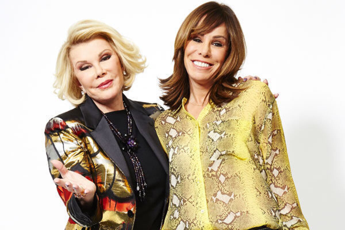 This Feb. 21, 2013 photo shows comedian Joan Rivers, left, and her daughter Melissa Rivers in New York.