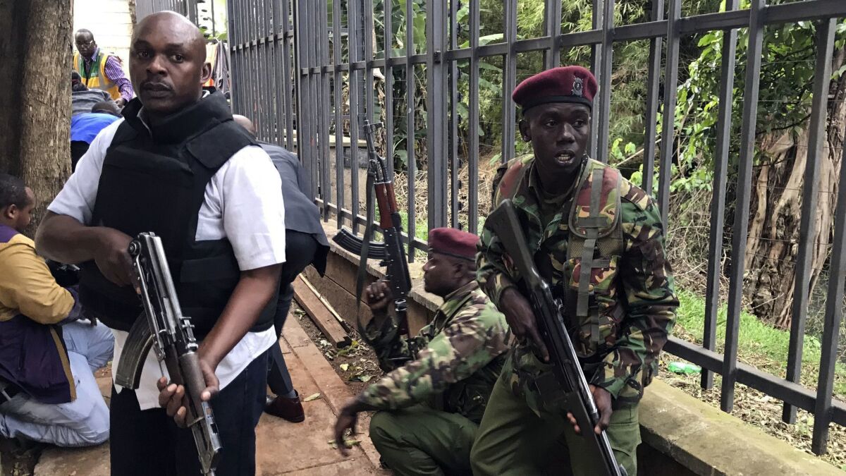 Security forces at the scene of the attack Jan. 15 in Nairobi, Kenya.