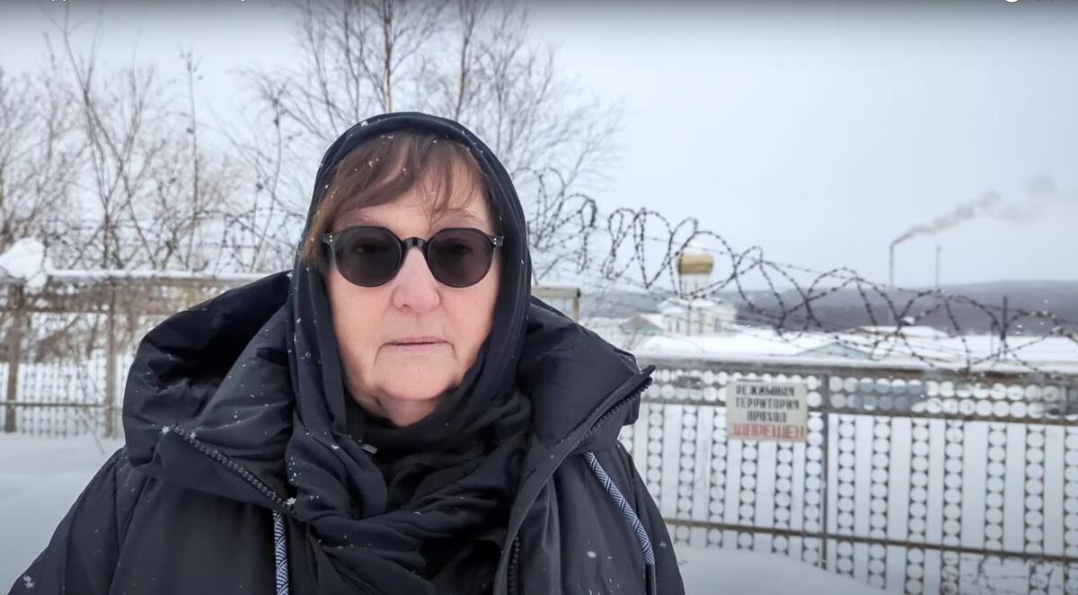Lyudmila Navalnaya, Alexei Navalny's mother, speaks near a prison colony in Kharp, Russia.