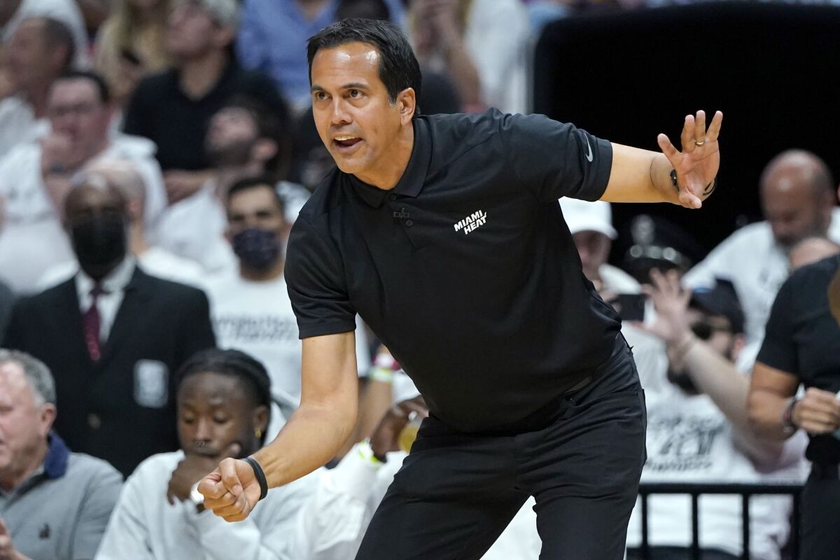 Miami Heat head coach Erik Spoelstra watches during the second half of Game 2 of an NBA basketball first-round playoff series against the Atlanta Hawks, Tuesday, April 19, 2022, in Miami. The Heat won 115-105. (AP Photo/Lynne Sladky)