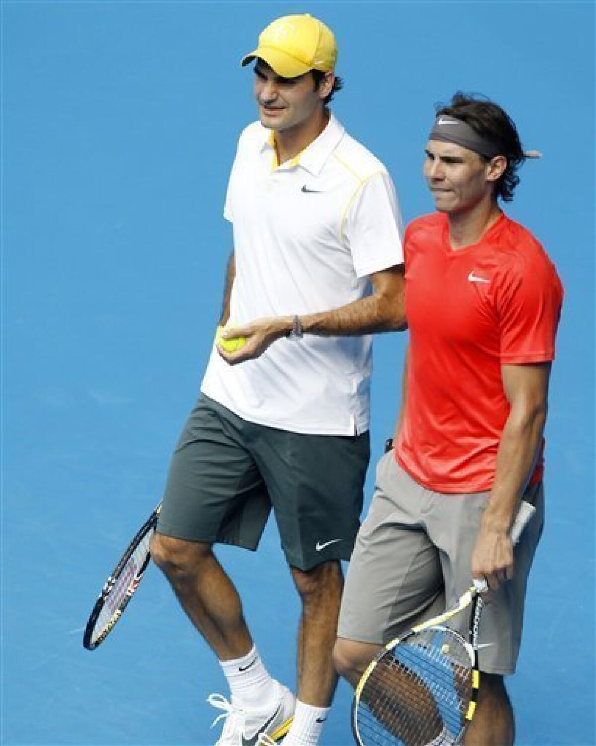 Friends for now, Rafa and Roger warm up together - The San Diego