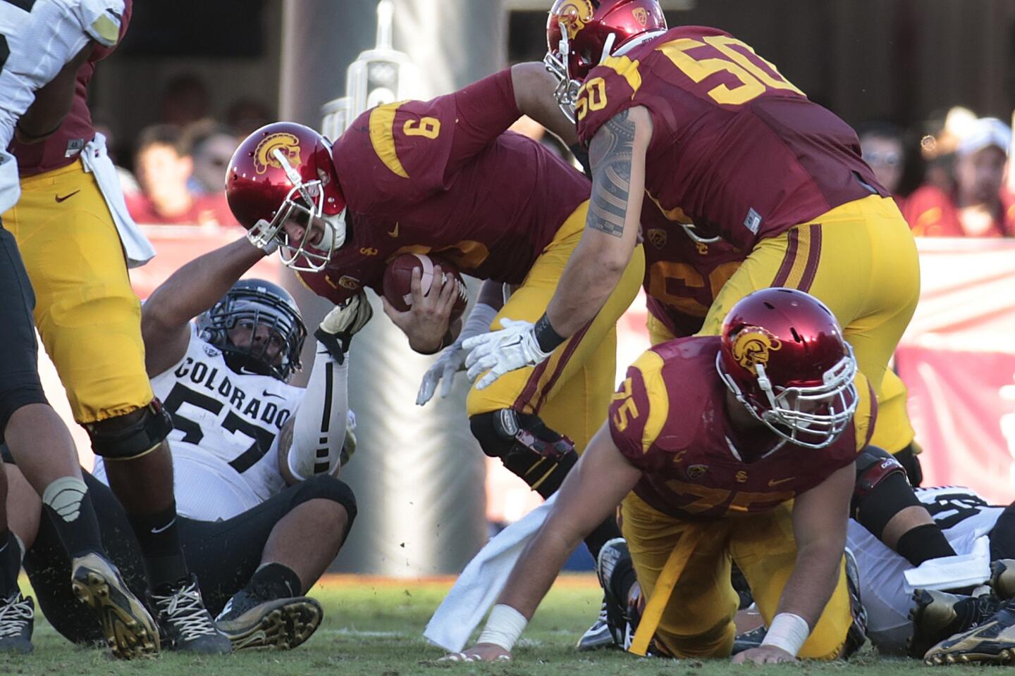 Cody Kessler, Justin Solis