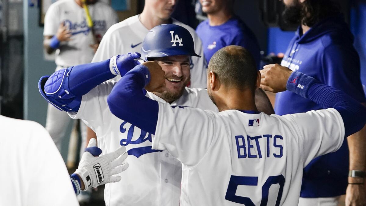 Rockies use clutch hitting to down Dodgers