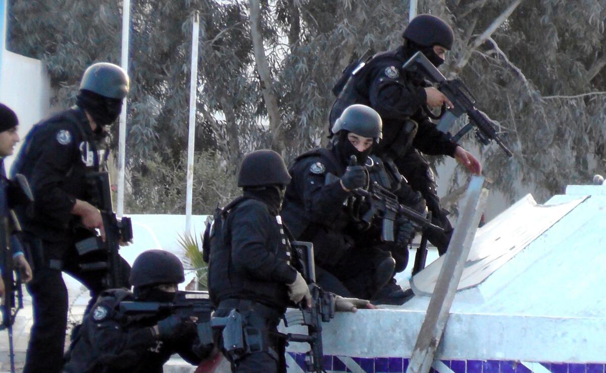 Tunisian special forces take position during clashes with militants in Ben Guerdane, near the Libyan border, on March 7.