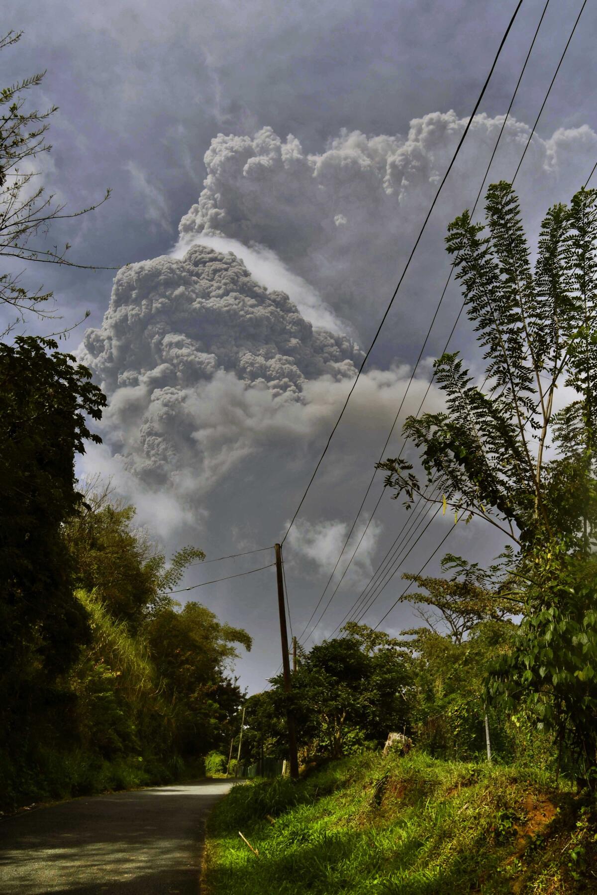 Plumes of ash rise from the La Soufriere volcano