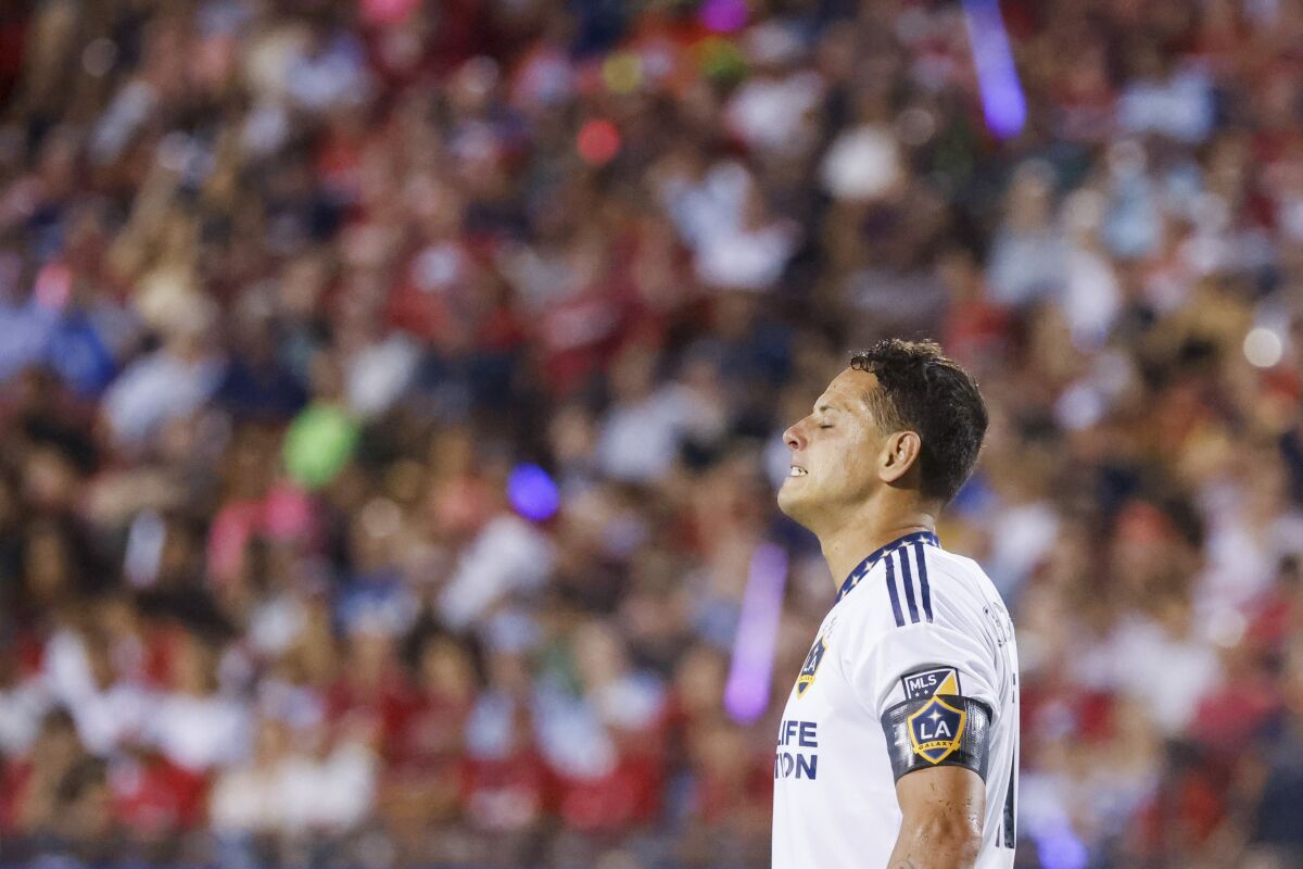 LA Galaxy forward Javier Hernández reacts after missing a shot against FC Dallas during the second half