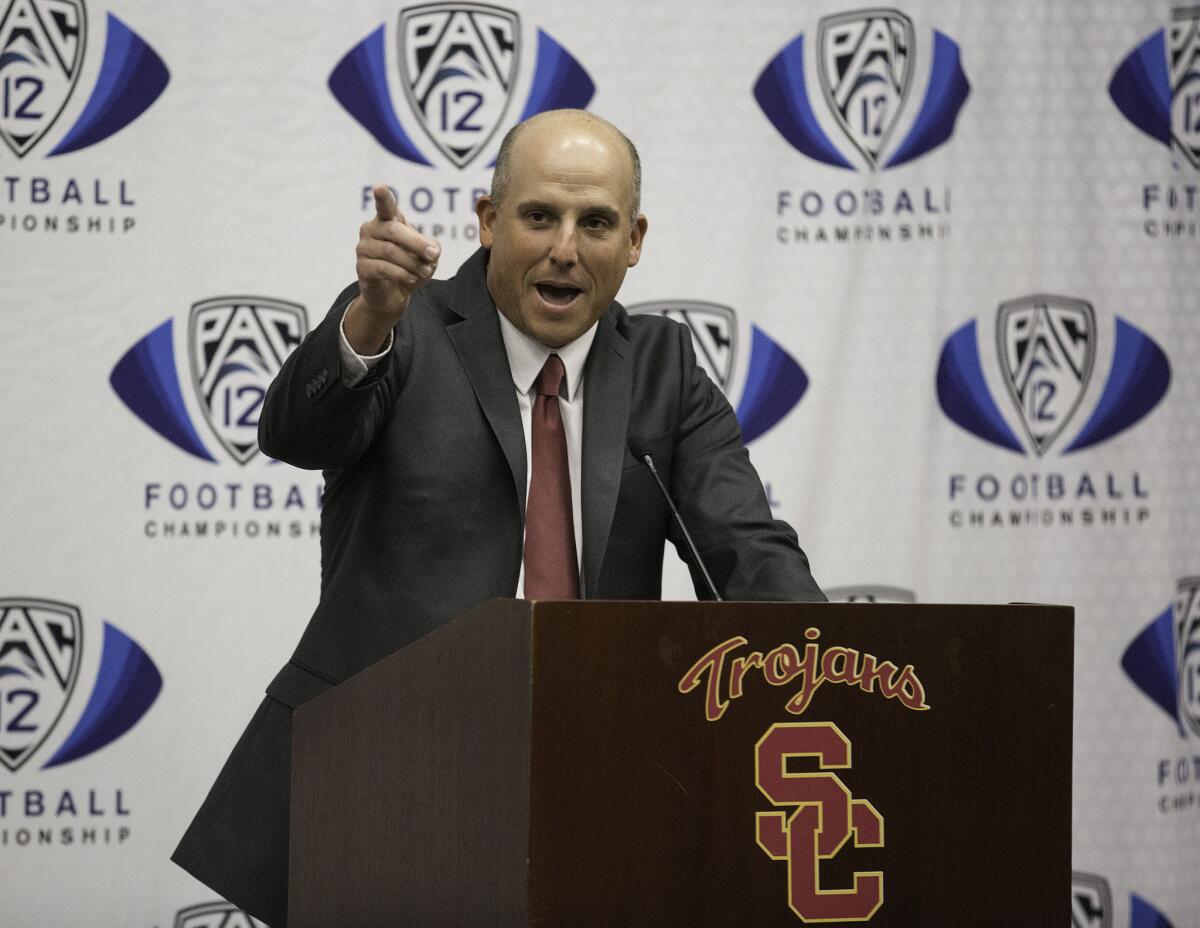 Clay Helton speaks Monday after being introduced as the Trojans' permanent head football coach during a news conference at USC.