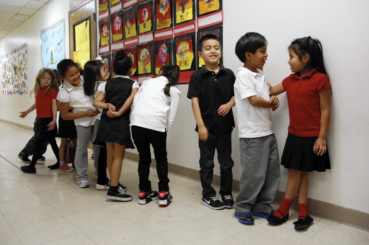 Kindergarten students line up for lunch at Metro Charter Elementary in downtown Los Angeles.