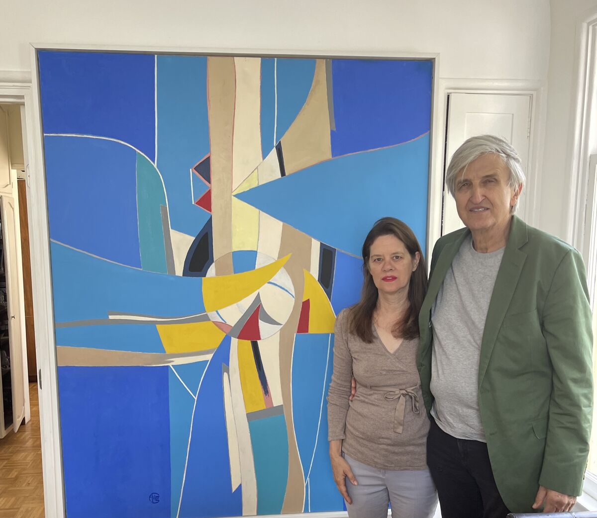 Francoise Gilot's "Streams of Gravitation" (2005) is pictured with her daughter Aurelia Engel and Engel's husband, Colas.