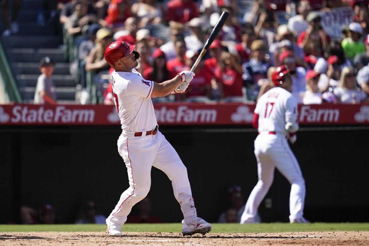 Angels' Mike Trout hits a home run during the fourth inning against the Texas Rangers.