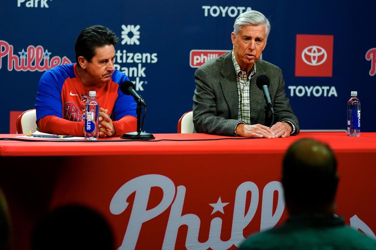 Phillies president of baseball operations Dave Dombrowski and interim manager Rob Thomson take part in a news conference