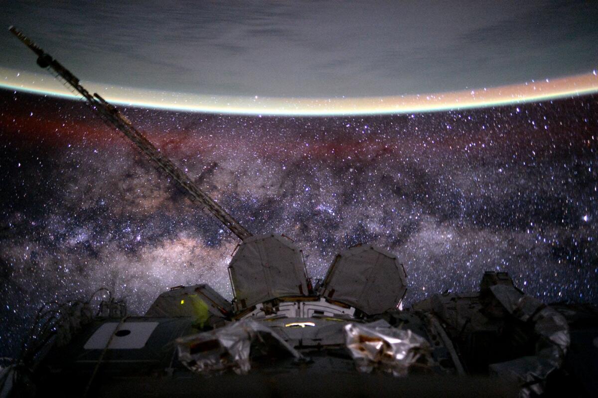 "Day 135. #MilkyWay. You're old, dusty, gassy and warped. But beautiful. Good night from @space_station! #YearInSpace".