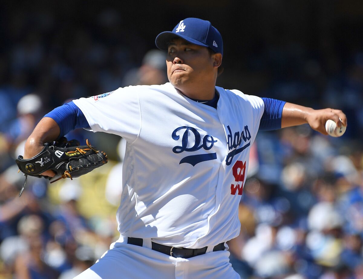 Hyun-Jin Ryu #99 of the Los Angeles Dodgers pitches in the second inning of the game against the San Diego Padres at Dodger Stadium on September 23, 2018 in Los Angeles, California.