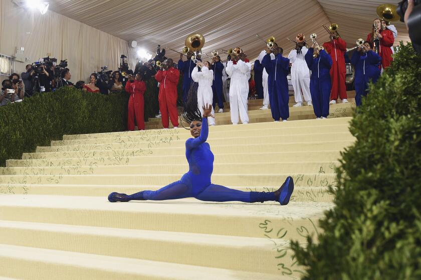 Nia Dennis and members of The Brooklyn United Marching Band perform at The Met gala