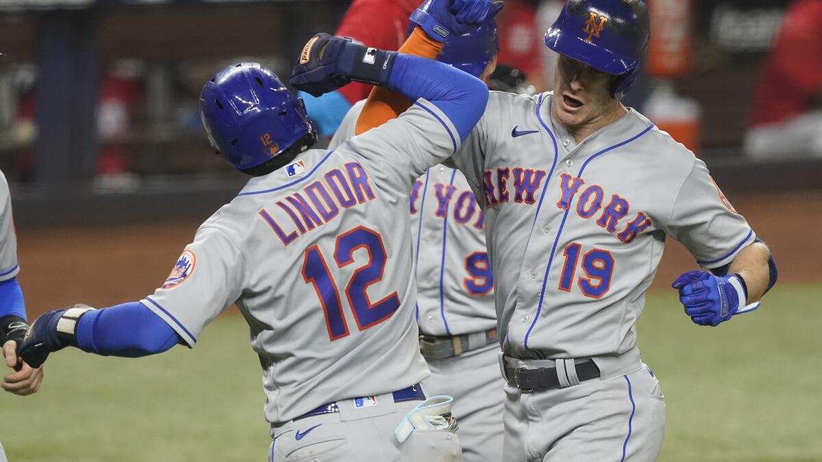 Canha's slam caps 8-run 4th inning, Mets rout Marlins 11-3