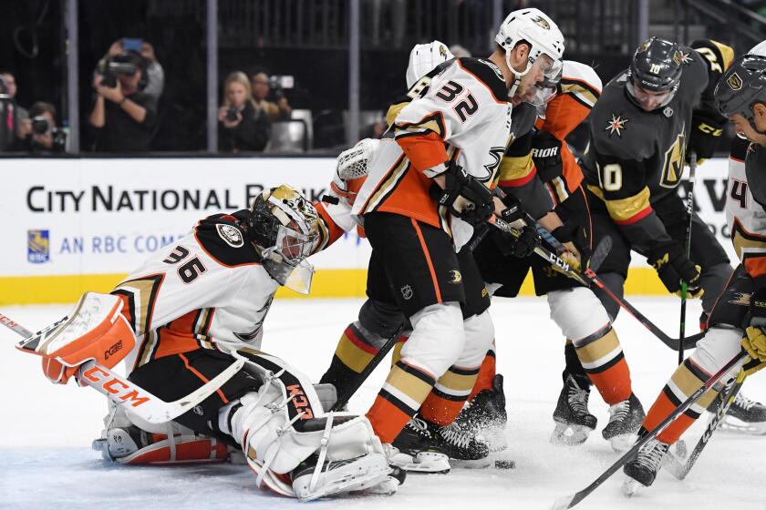 LAS VEGAS, NEVADA - OCTOBER 27: John Gibson #36 and Jacob Larsson #32 of the Anaheim Ducks defend the net in the second period of their game against the Vegas Golden Knights at T-Mobile Arena on October 27, 2019 in Las Vegas, Nevada. (Photo by Ethan Miller/Getty Images)