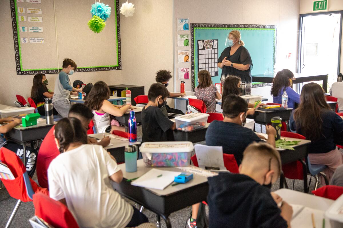 Rya Hege teaches her 4th grade class at T.H.E Leadership Academy on Wednesday, Oct. 21, 2020 in Vista, CA.