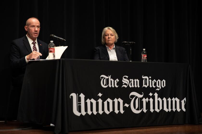 San Diego, CA - October 25: San Diego sheriff candidates John Hemmerling and Kelly Martinez participate in a forum hosted by The San Diego Union-Tribune Opinion at the San Diego Central Library in San Diego, CA on Tuesday, Oct. 25, 2022. (Adriana Heldiz / The San Diego Union-Tribune)