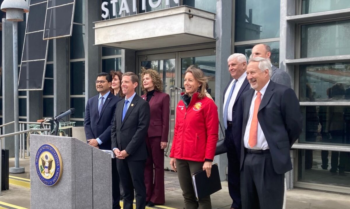 Rep. Mike Levin leads a news conference Thursday outside the Solana Beach train station.