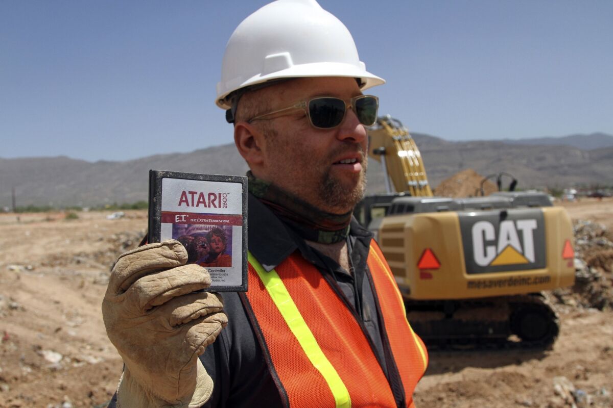 Film Director Zak Penn shows a box of a decades-old Atari 'E.T. the Extra-Terrestrial' game cartridges found in a landfill in Alamogordo, N.M.