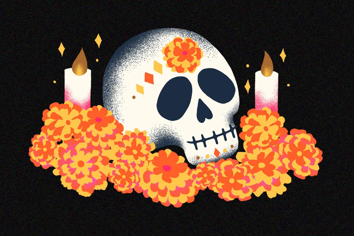 Sugar skull surrounded by candles and marigolds