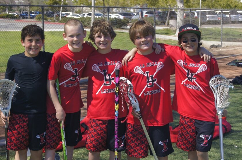 La Jolla Lacrosse Club’s fourth-grade boys are happy after an early game of a winning season last spring. Courtesy