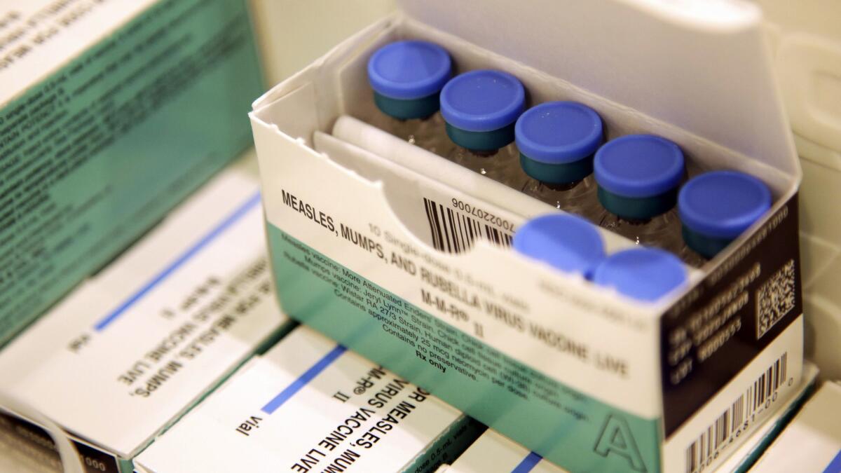 Measles, mumps and rubella vaccines sit in a cooler at the Rockland County Health Department in New York.