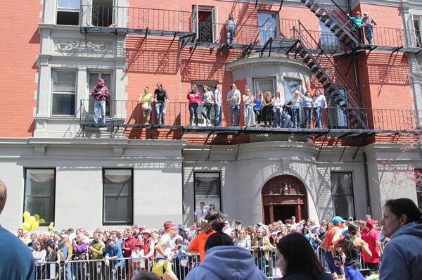 Bostonians watch marathon from balconies