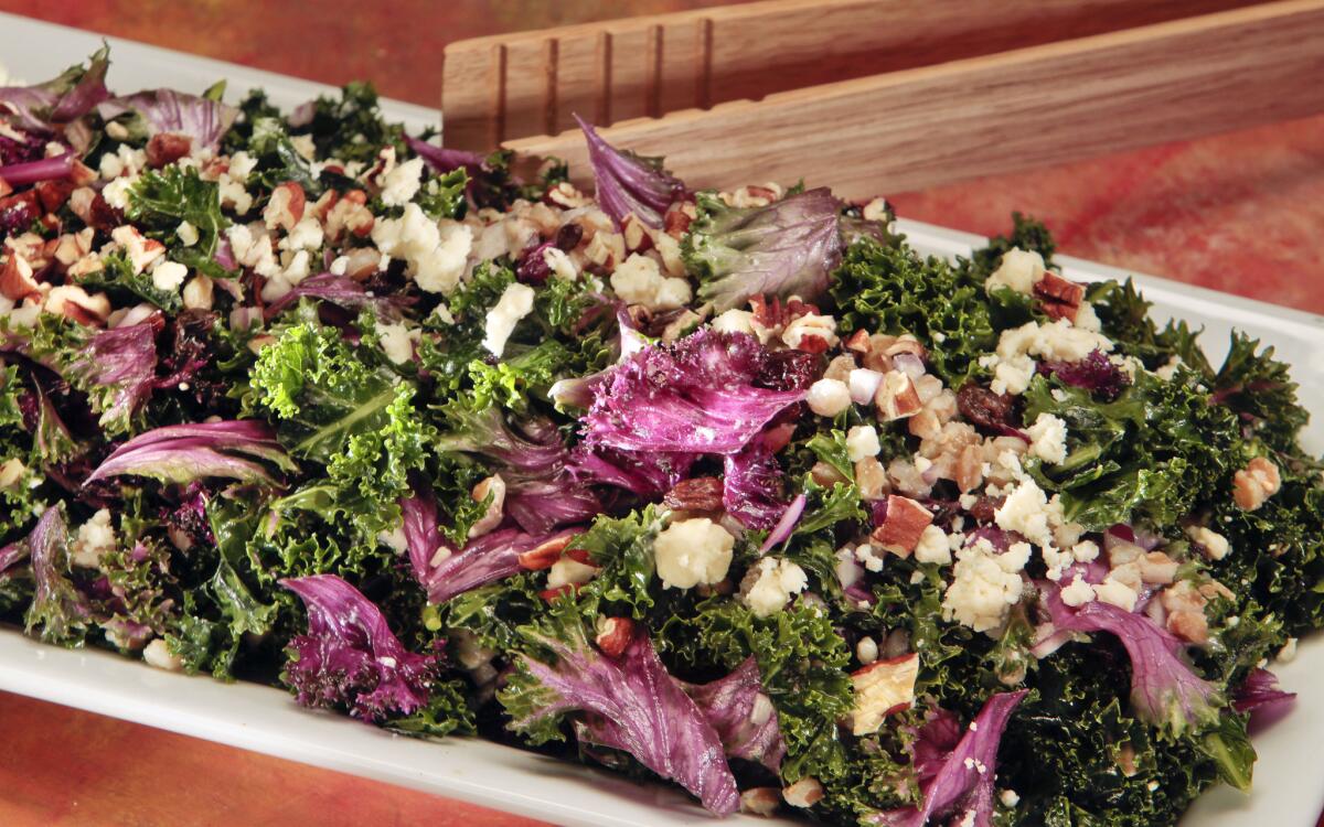 Kale salad with farro, dried fruit and blue cheese