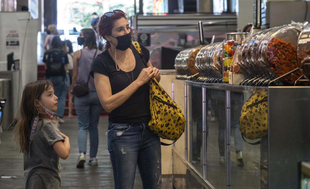 A woman and child shop at Grand Central Market in Los Angeles. 