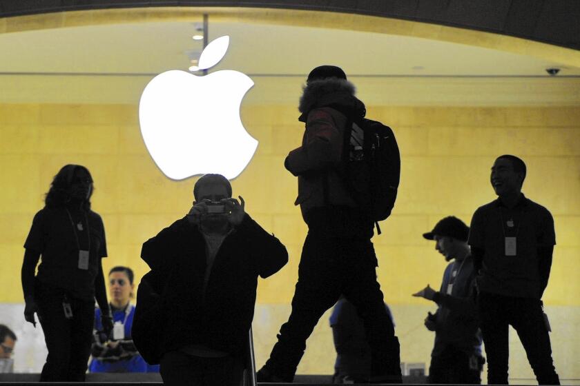 Apple chief Tim Cook said his company would fight a court order in the San Bernardino terror inquiry that asks the company for software to allow authorities to bypass the passcode on an encrypted phone. Above, an Apple store in New York.