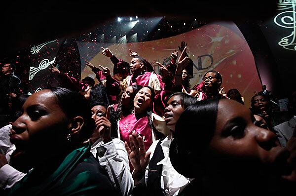 From Los Angeles County, Family Life Center Sanctuary Choir (center girl) and other choirs perform during "How Sweet the Sound" national church choir competition that culminated at the Staples Center on Friday.