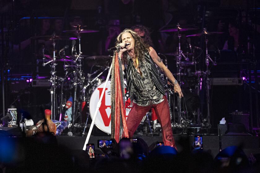 FILE - Steven Tyler of Aerosmith performs during night one of their "Peace Out: The Farewell Tour" on Sept. 2, 2023, at Wells Fargo Center in Philadelphia. The band said Friday, Aug. 2, 2024, that Tyler's voice has been permanently damaged by a vocal cord injury last year and the band will no longer tour. (Photo by Amy Harris/Invision/AP, File)
