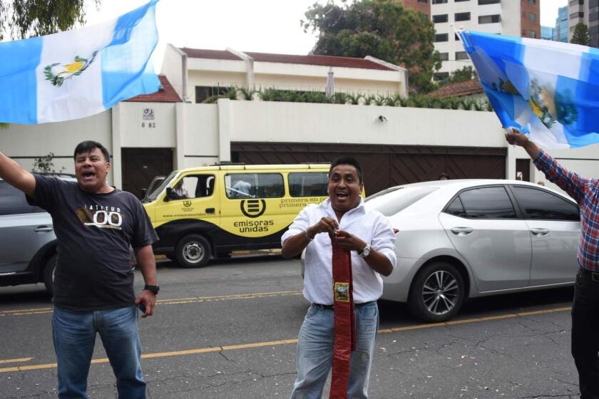 Men demonstrate in favor of the International Commission against Impunity in Guatemala (CICIG) outside its headquarters in Guatemala City on August 31, 2018. - Guatemalan President Jimmy Morales announced Friday Guatemala will not renew the mandate of a UN anti-corrption mission, which he accused of improper interference on internal matters of the country. (Photo by Johan ORDONEZ / AFP)JOHAN ORDONEZ/AFP/Getty Images ** OUTS - ELSENT, FPG, CM - OUTS * NM, PH, VA if sourced by CT, LA or MoD **