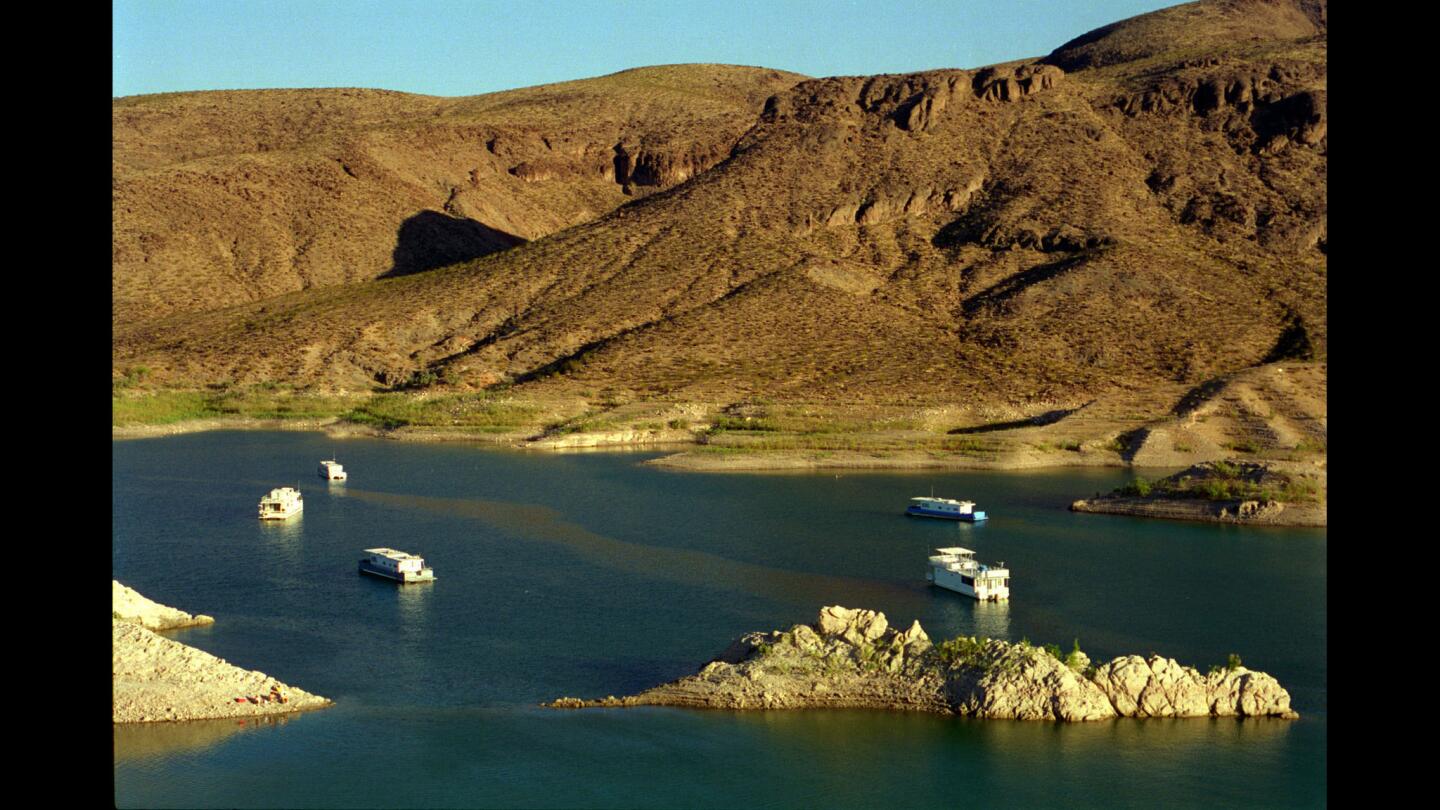 Houseboats dock at the Echo Bay Marina in Lake Mead in 1994, before the start of a 15-year drop in the lake's water level.