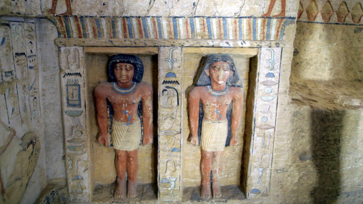 Statues inside the newly discovered tomb of "Wahtye," a priest during the reign of King Neferirkare, in Saqqara, Egypt.