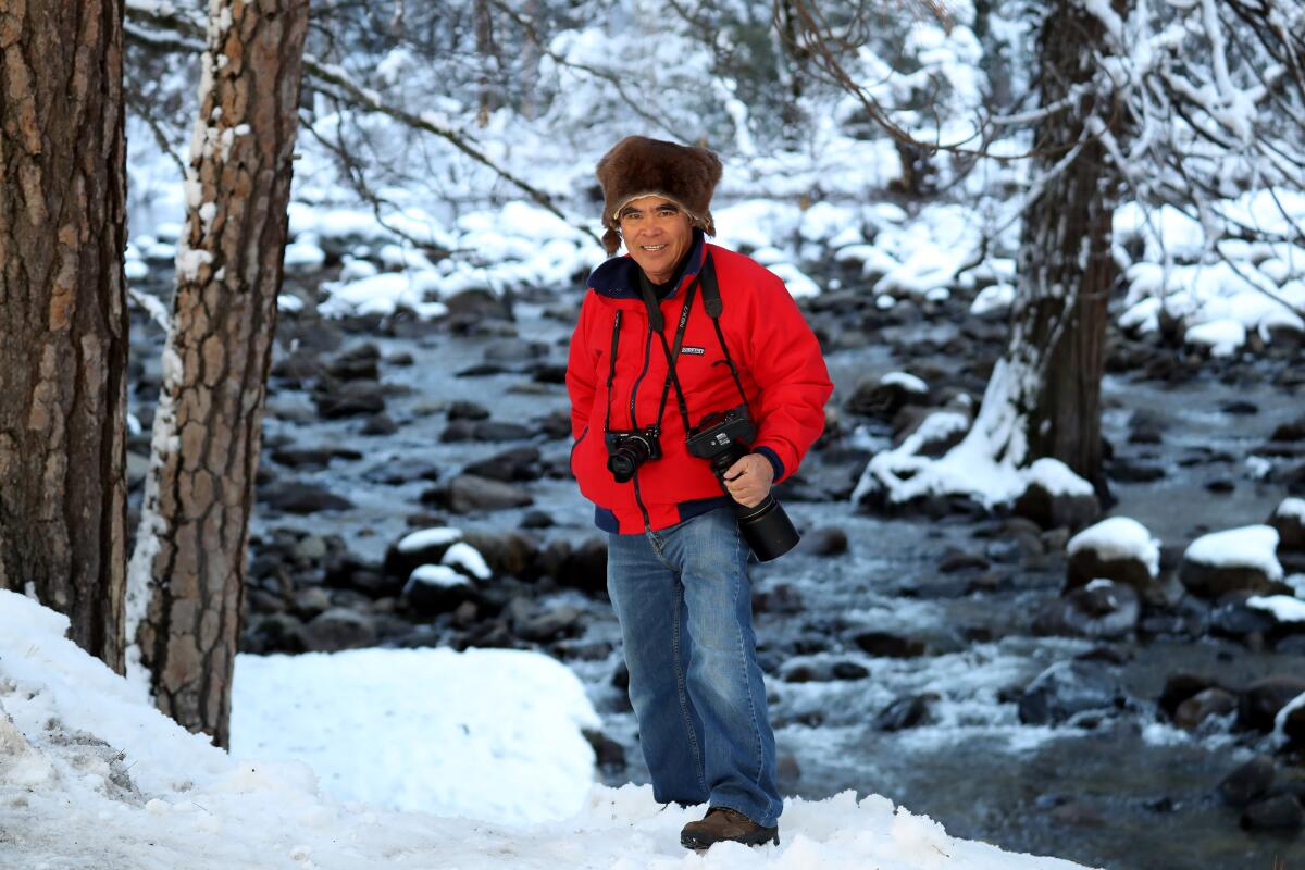 Photographer Nick Ut was bundled up with a warm hat and multiple jackets while on a photo expedition to see the firefall off Horsetail Fall.